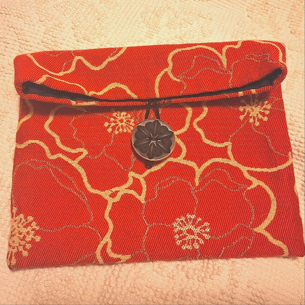 Handmade clutch with button clasp